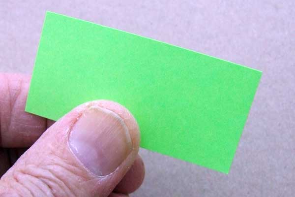 A demonstration bright green single card