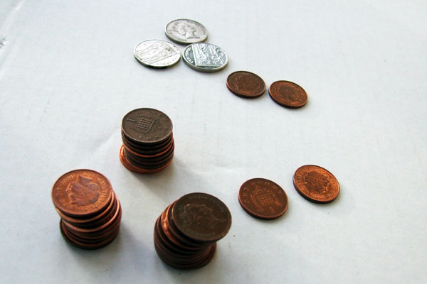 An emptied pocket of mixed coins