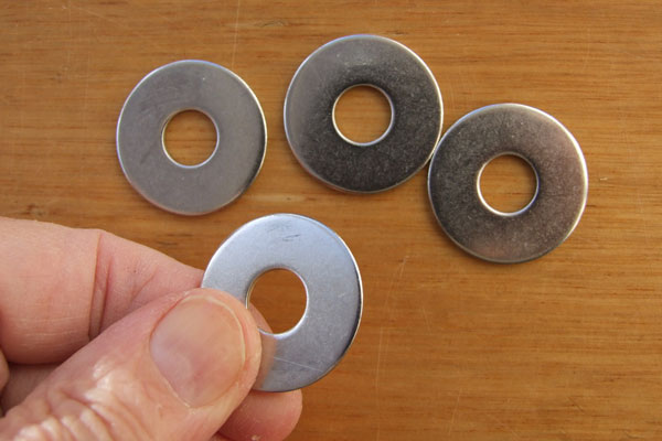Four steel washers