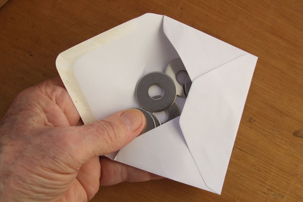 Put washers into an envelope