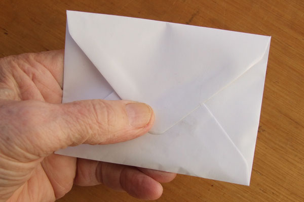 Seal the envelope with washers inside