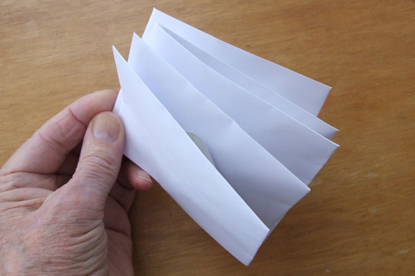 Five envelopes contain fifty washers