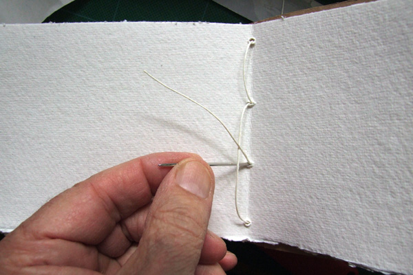 Final stitch of a sewn single section