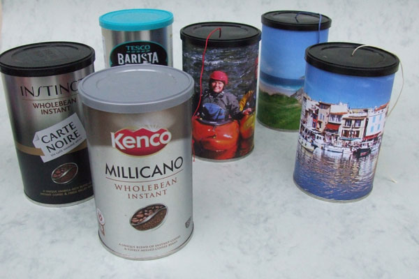 Empty and recycled coffee tins