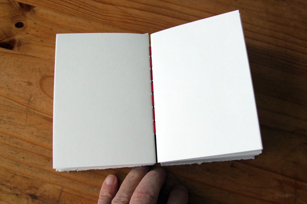 Opened spread of an Arkwright style bound book