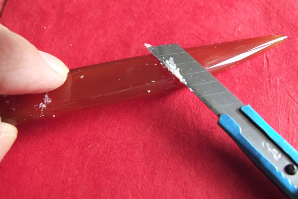 Cleaning an agate creaser
