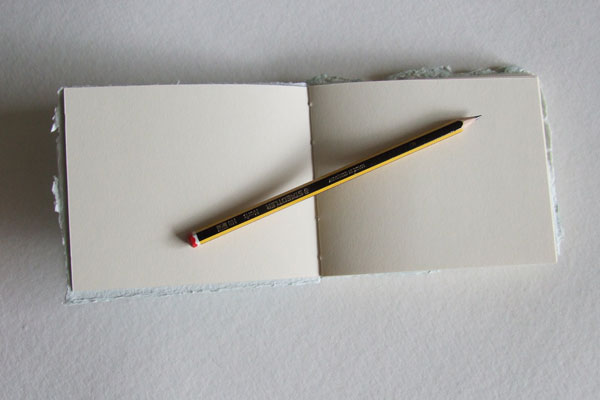 Cheng book shown fully open ~ with a pencil for scale