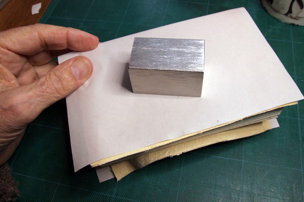 Stainless steel weight being used for light pressure 
